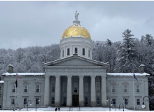 Vermont State Capital Building in winter with snow.